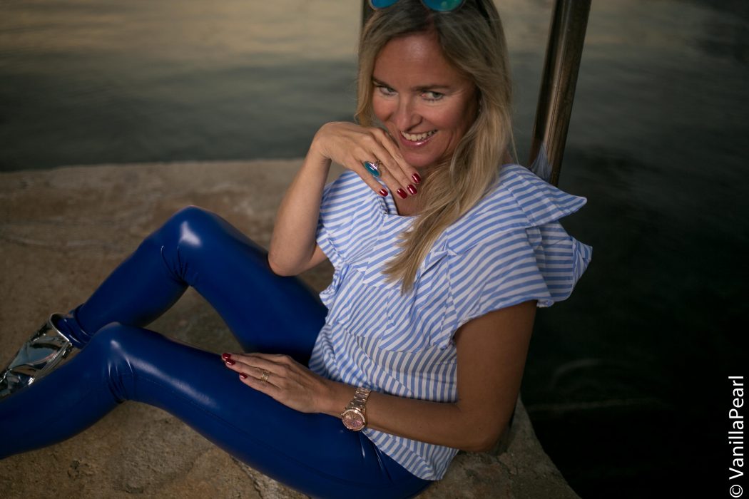 Christina in Poren Croatia with blue vinyl pants